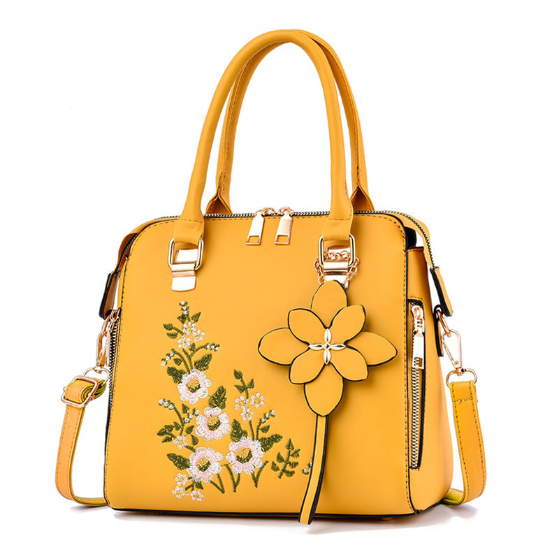 Shoulder bag with messenger embroidery